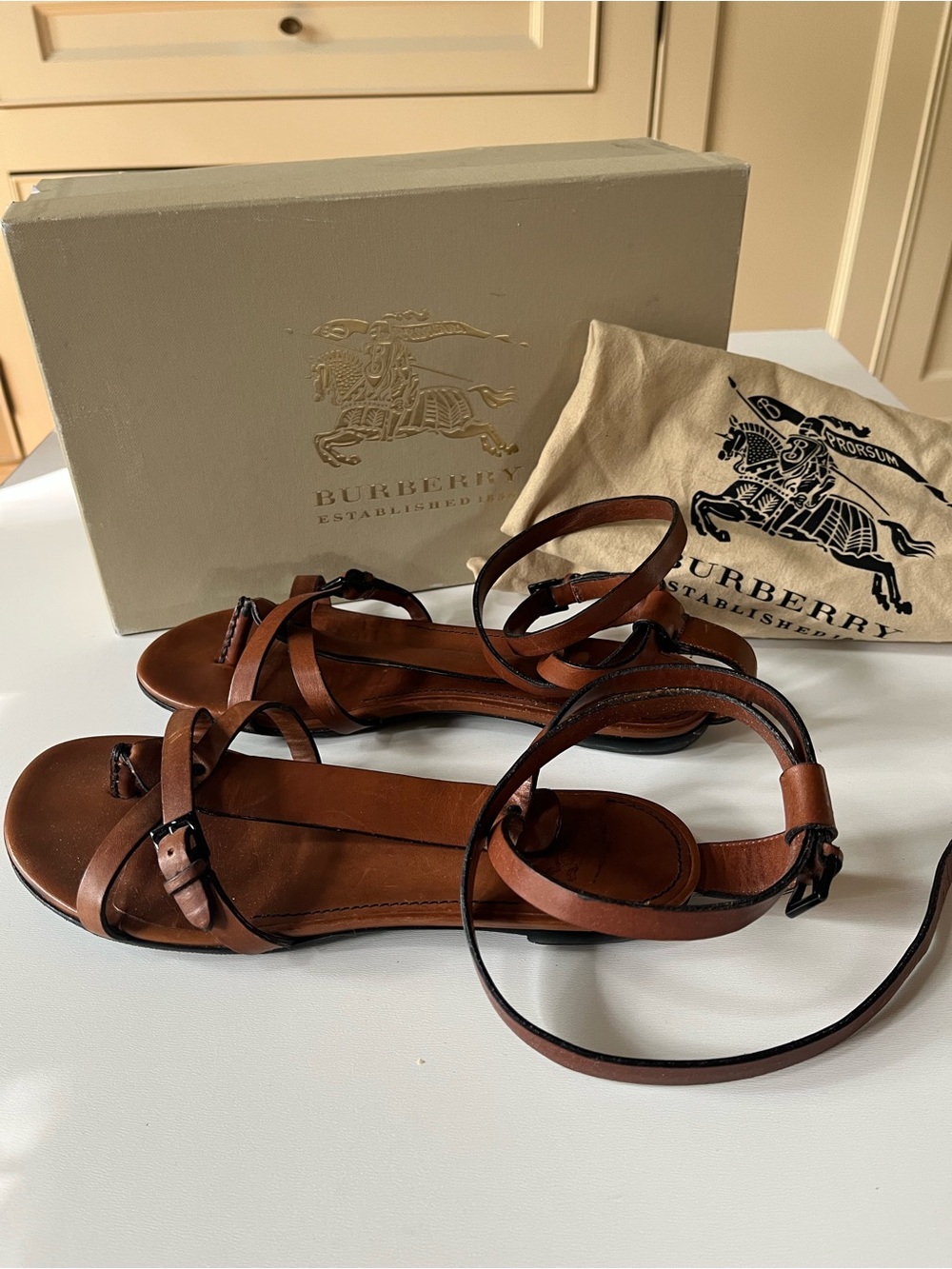 Burberry brown leather wrap ankle strap flat sandals. Worn twice. Sz 37.5